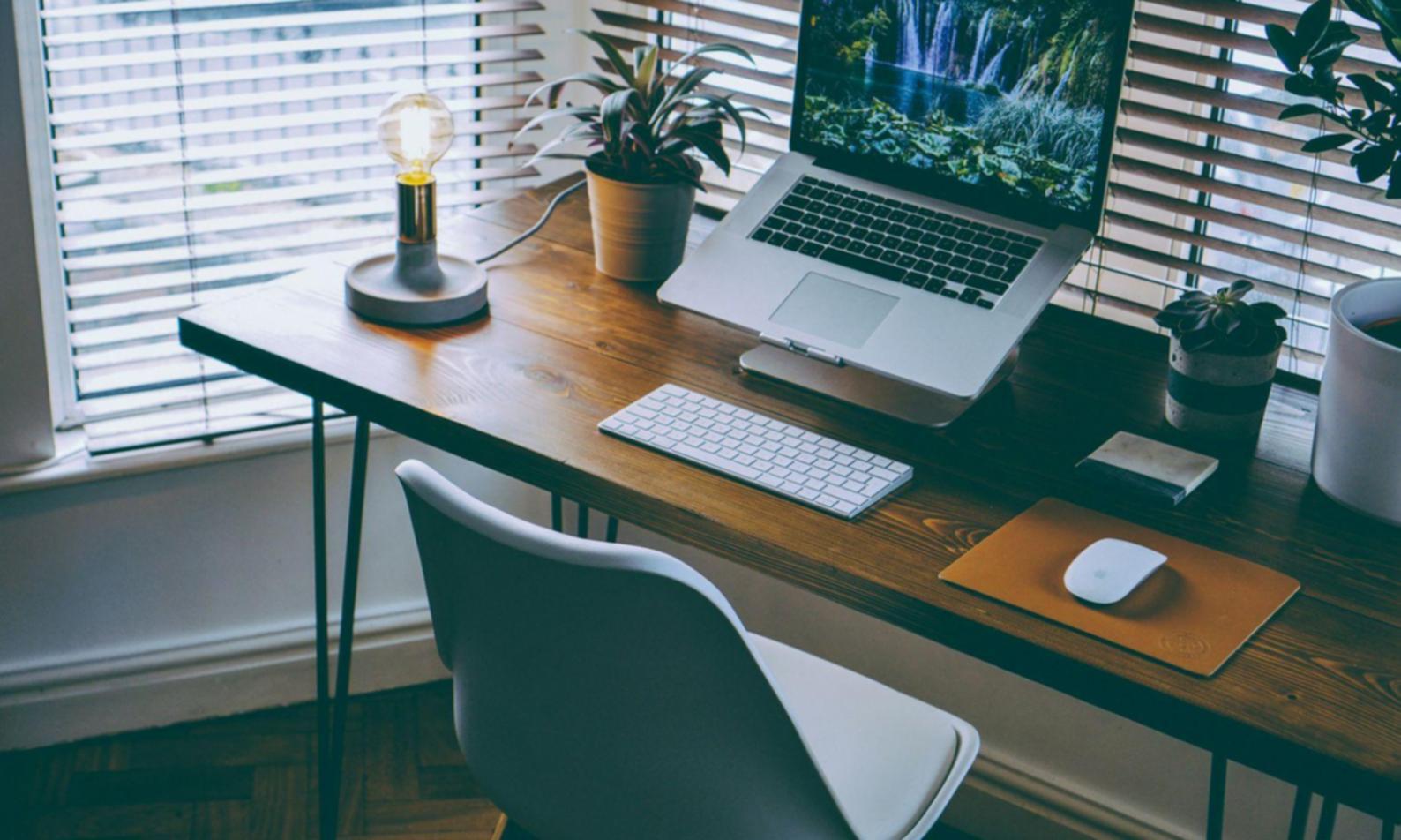 Trading desk setup with multiple monitors displaying market data